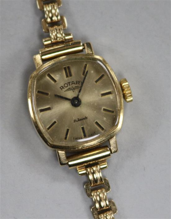 A ladys 9ct gold Rotary manual wind wrist watch, on a 9ct gold bracelet.